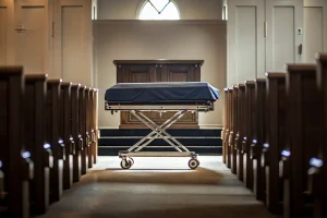 Professional mortuary cot with a dignified navy cover