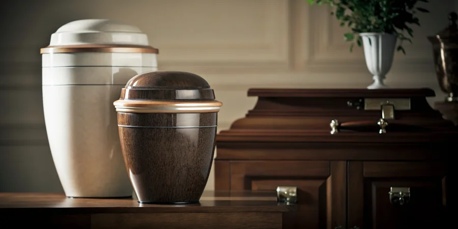 Burial urn vault beside a cremation urn